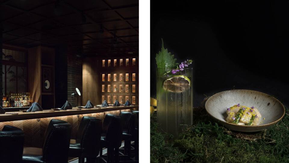 A collage of side-by-side photos: On the left is the darkened interior of a high-end restaurant. The seating is black leather, and black napkins are perched just so along the ornate sushi bar.  on the left, a striking piece of earthenware pottery holds a delicate seafood adorned with edible flowers. Next to it, a cold drink is accented with a spiral of citrus and lavendar. The meal is served on a moss-covered tablesetting. The lighting in both photos is low, creating a dark and mysterious mood for diners. 