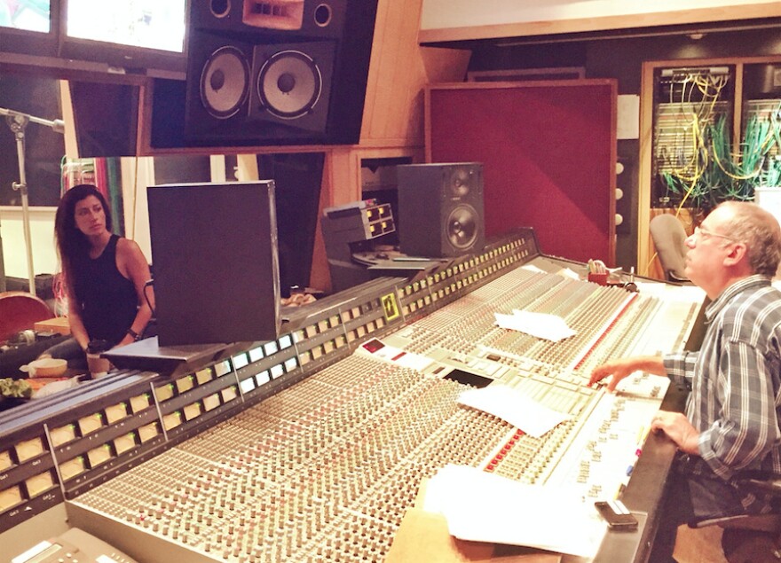 Music producer Larry Klein in the studio with musician Ana Moura. 