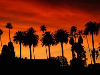 A sunset is seen above the two steeples of Good Shepherd Catholic Church during a 2010 heat wave in Beverly Hills.