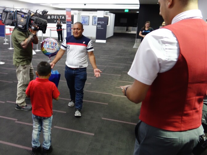Hermelindo Che Coc, an unauthorized immigrant from Guatemala, greets his son Jefferson at Los Angeles International Airport on July 14, 2018. The pair were apprehended in Texas and separated for 48 days under the Trump administration's "zero tolerance" policy.