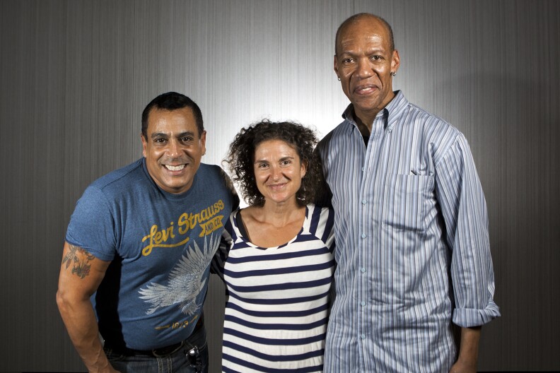 Take Two host Alex Cohen poses with Felipe Rose and Alex Briley of The Village People. The band will release their first single in 25 years, called "Let's Go Back to the Dance Floor."