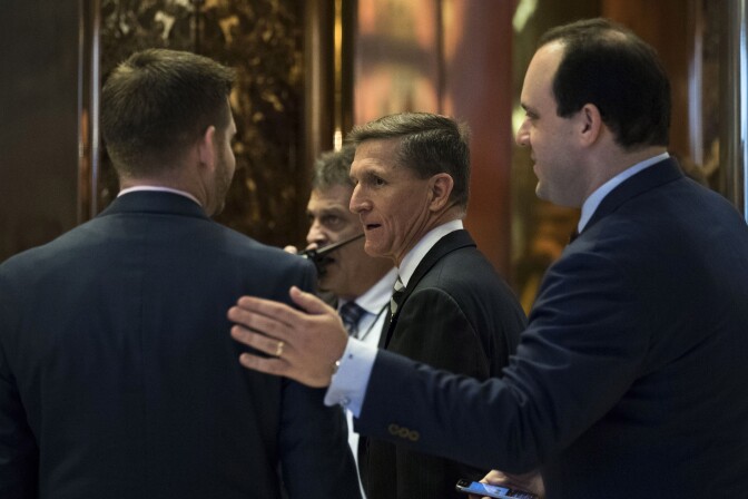 NEW YORK, NY - NOVEMBER 17: Retired Lt. Gen. Michael Flynn (C) arrives at Trump Tower, November 17, 2016 in New York City. President-elect Donald Trump and his transition team are in the process of filling cabinet and high level positions for the new administration. Trump campaign senior advisor Boris Epshteyn is seen at right. (Photo by Drew Angerer/Getty Images)