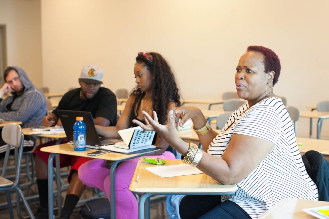 Cynthia Graham, right, participates in a discussion in Leslie Tejada's  English 100 class at West Los Angeles College in Los Angeles, Calif. on Thursday, Nov. 3, 2016.