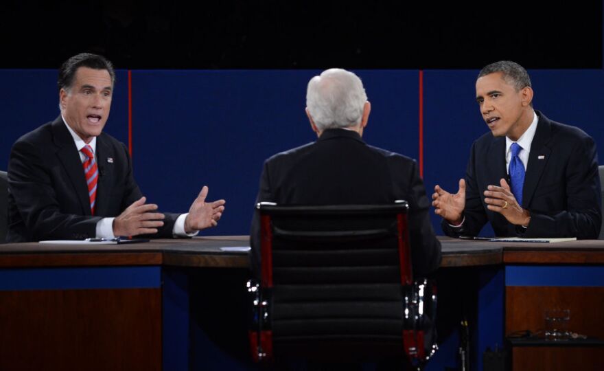 President Barack Obama debates with Republican presidential candidate Mitt Romney on Oct. 22, 2012 at the start of the third presidential debate at Lynn University in Boca Raton, Florida.