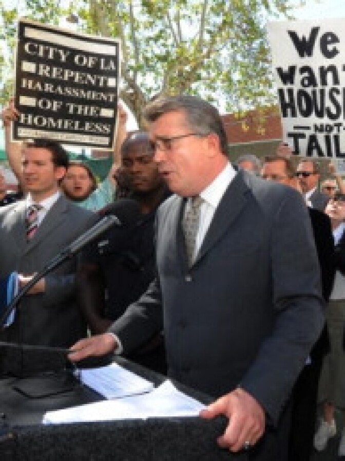 Skid Row activists surround Los Angeles City Attorney Carmen Trutanich (L) and Los Angeles County Sheriff Lee Baca (R) as they try to announce a new civil injunction against several dozen individuals, including gang members in an attempt to stem drug activity in the Skid Row area of Los Angeles on April 7, 2010. Mexican drug cartels are increasing their dominance in the illegal US drug market through closer ties with street gangs and increased production, according to a recent US Justice Department report. Mexican drug trafficking organizations (DTOs), 'already the predominant wholesale suppliers of illicit drugs in the United States, are gaining even greater strength in eastern drug markets where Colombian DTO strength is diminishing,' read the report.