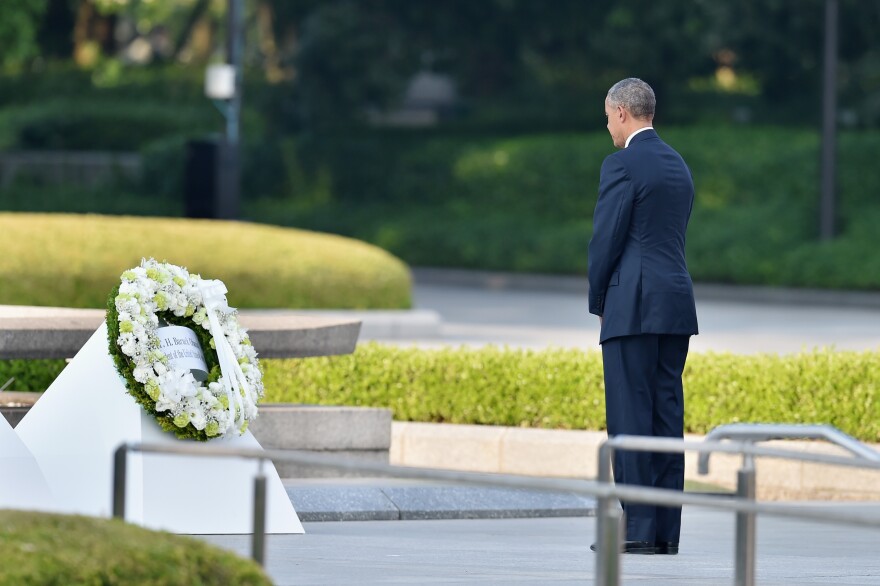 HIROSHIMA, JAPAN - MAY 27:  U.S. President Barack Obama gives flowers during his visit to the Hiroshima Peace Memorial Park on May 27, 2016 in Hiroshima, Japan. It is the first time U.S. President makes an official visit to Hiroshima, the site where the atomic bomb was dropped in the end of World War II on August 6, 1945.  (Photo by Atsushi Tomura/Getty Images)
