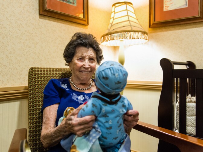 When asked what she likes about the dolls, Guzofsky says, "I love babies."