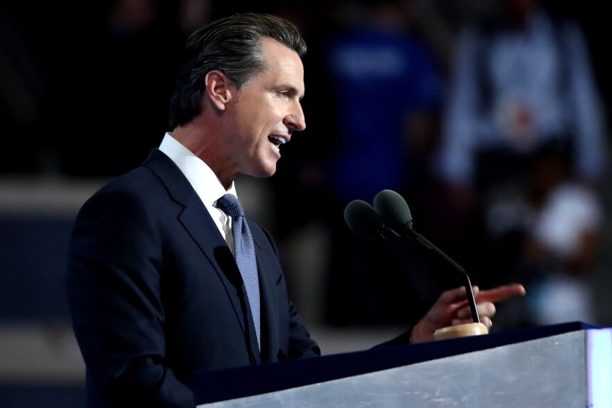 PHILADELPHIA, PA - JULY 27: Lt. Gov. Gavin Newsom (D-CA) delivers remarks on the third day of the Democratic National Convention at the Wells Fargo Center, July 27, 2016 in Philadelphia, Pennsylvania. Democratic presidential candidate Hillary Clinton received the number of votes needed to secure the party's nomination. An estimated 50,000 people are expected in Philadelphia, including hundreds of protesters and members of the media. The four-day Democratic National Convention kicked off July 25. (Photo by Jessica Kourkounis/Getty Images)