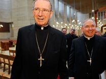 Cardinal Roger Mahony (L) walks with his successor, San Antonio, Texas Archbishop Jose Gomez (2nd L), after a news conference at the Cathedral of Our Lady of the Angels on April 6, 2010 in Los Angeles, California. Gomez, 58, will take over the archdiocese of Los Angeles when Cardinal Mahoney retires.  