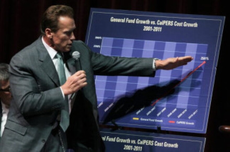 California governor Arnold Schwarzenegger points to a chart as he talks about the State budget during an appearance at City Summit in San Francisco, California in August 2010.