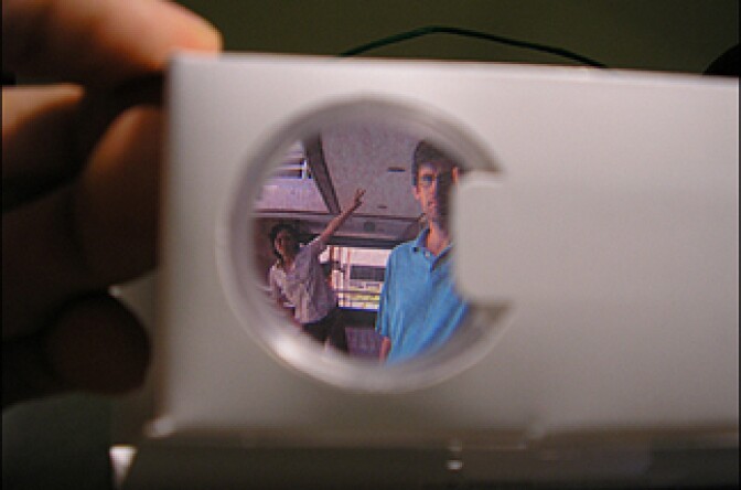 John and Queena... through the looking glass.