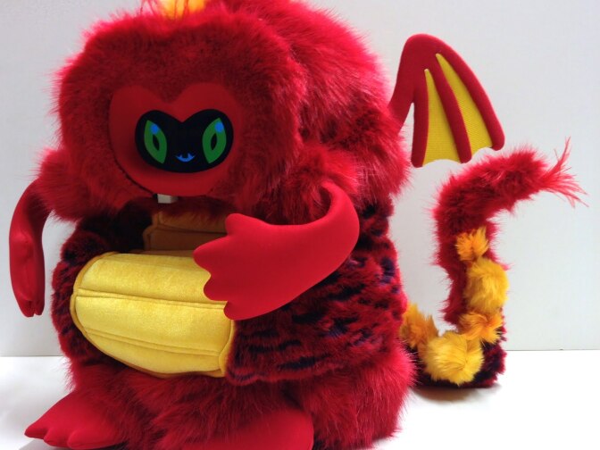 This is a sideview of the dragonbot named Chili that encourages students to make healthy food choices.