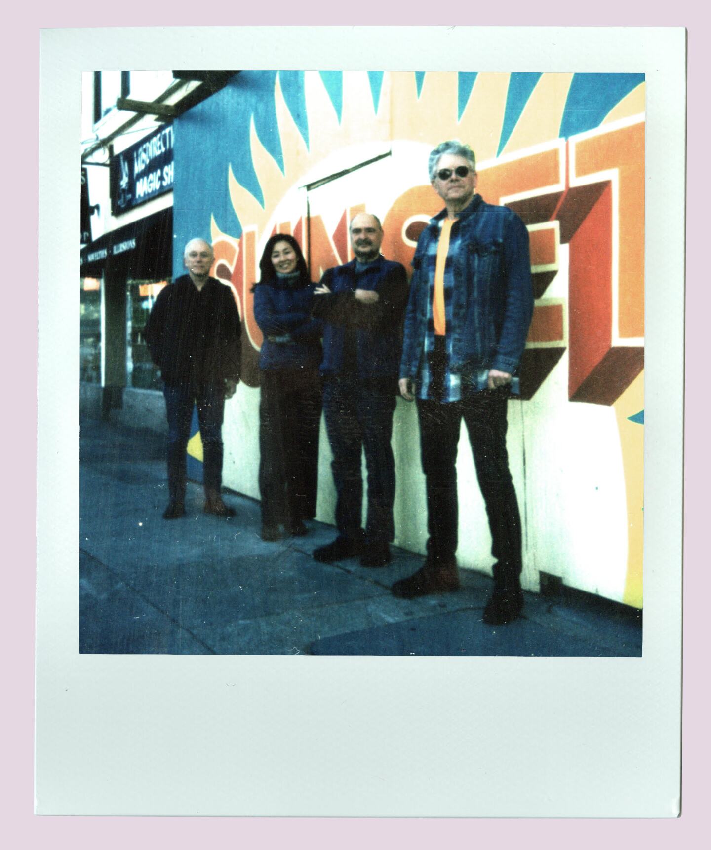 4 members of the Kronos Quartet in a Polaroid image
