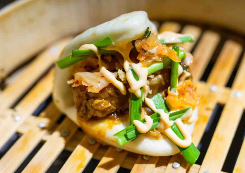 An image of a an open-faced bao bun from Taos Bao.