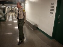 L.A. County Sheriff Lee Baca conducts an inspection of Men's Central Jail in Downtown Los Angeles in this photo from December 2011.