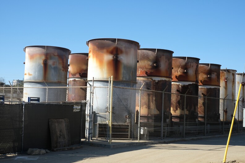 Large cylindrical flares for flaring methane at Scholl Canyon Landfill.