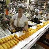 Workers prepare Hostess Twinkies for packaging at the Interstate Bakeries Corporation facility. 