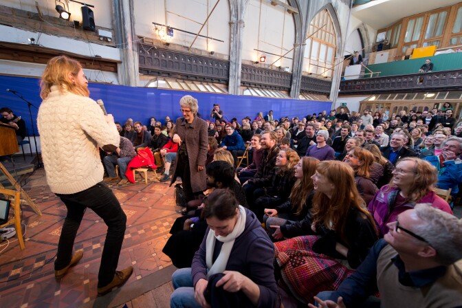 British comedian Sanderson Jones, a co-founder of The Sunday Assembly, an atheist service held at a converted church, leads a service in north London, on March 3, 2013. 