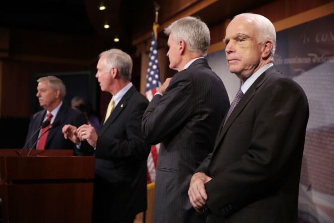 WASHINGTON, DC - JULY 27:  (L-R) Sen. Lindsey Graham (R-SC), Sen. Ron Johnson (R-WI), Sen. Bill Cassidy (R-LA) and Sen. John McCain (R-AZ) hold a news conference to say they would not support a 'Skinny Repeal' of health care at the U.S. Capitol July 27, 2017 in Washington, DC. The Republican senators said they would not support any legislation to repeal and replace Obamacare unless it was guaranteed to go to conference with the House of Representatives.  (Photo by Chip Somodevilla/Getty Images)