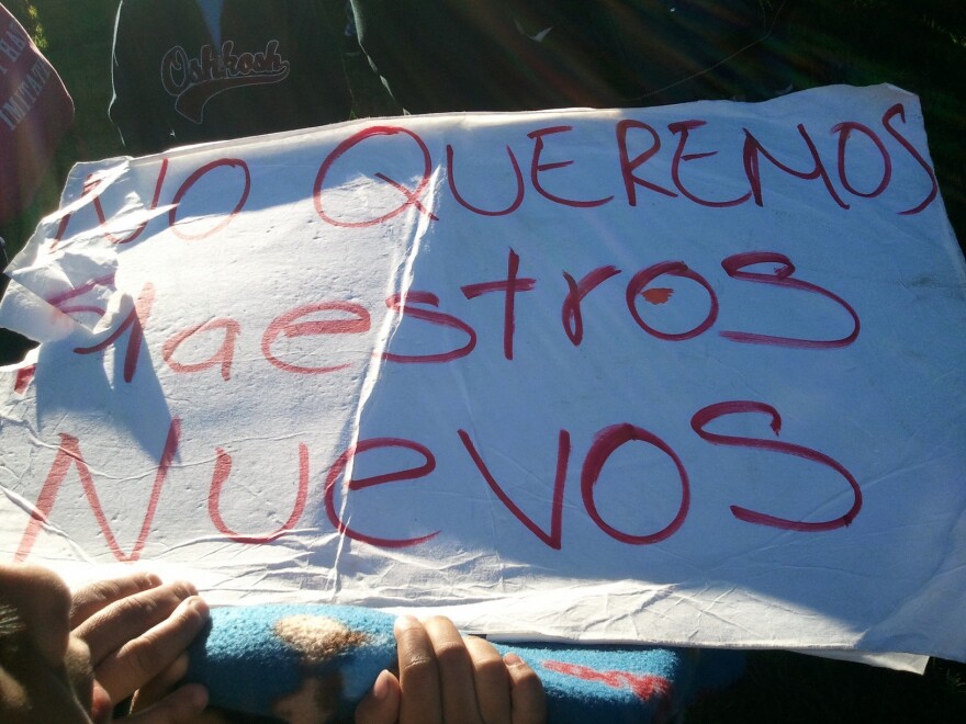 Miramonte students and parents protest a complete change in faculty and staff at the elementary school. The protest sign reads: "We don't want new teachers"