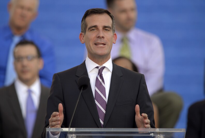 Los Angeles Mayor Eric Garcetti speaks in front of city hall after being sworn in, Sunday, June 30, 2013, in Los Angeles. (AP Photo/Mark J. Terrill)
