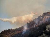 A drop is made near Route 39 on Thursday afternoon. The Colby Fire is 30 percent contained and has burned 1,700 acres in the mountains near Glendora according to LA County Fire.