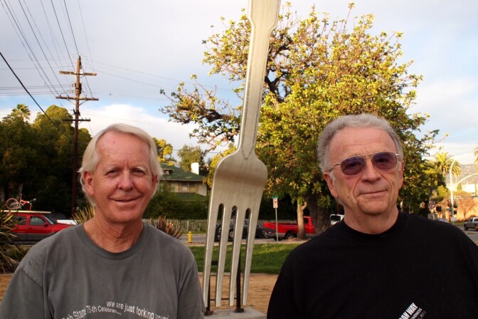 Ken Marshall (left) with Bob Stane in front of their "Fork in the Road" sculpture in Pasadena.