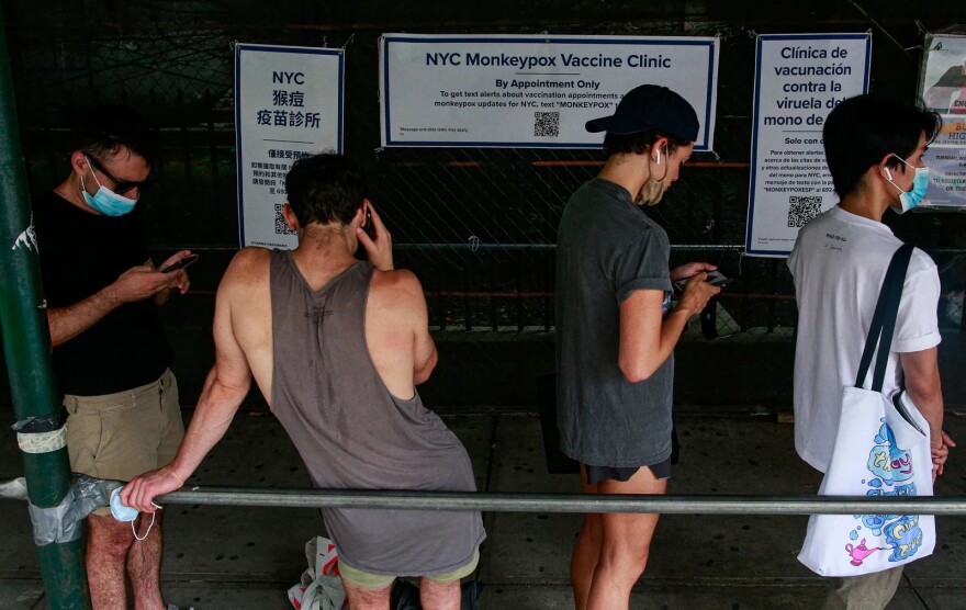 People wait in line to receive the monkeypox vaccine in Brooklyn.