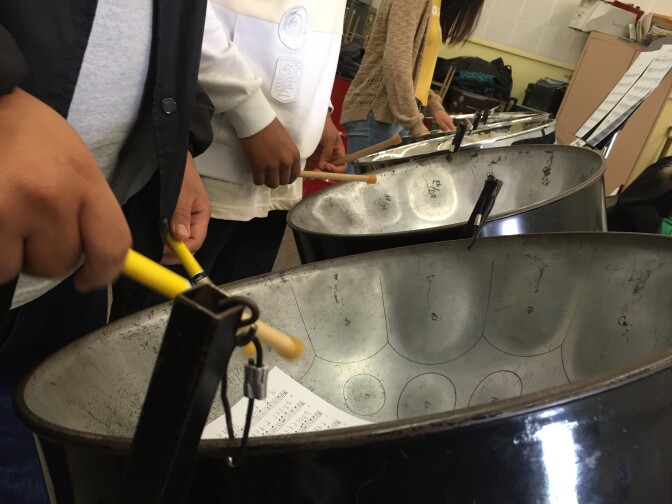 Students in the steel drum class at Venice High School practice for a performance at the Grand Arts Festival. 