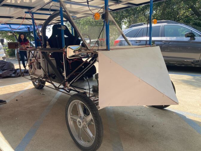 A close-up photo of a solar-powered car built by students.