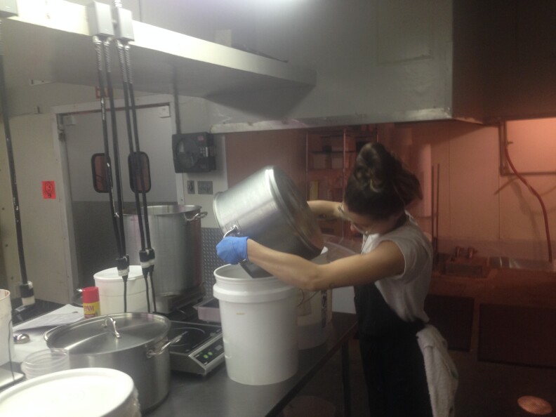 Salt and Straw's Katie Burnett making a fresh batch of ice cream