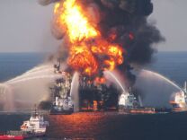 Justice Department prosecutors secured new indictments Wednesday against a former BP engineer and a former BP executive charged separately with obstructing probes of the company's 2010 oil spill in the Gulf of Mexico. (Photo: The Deepwater Horizon oil rig burned on April 21, 2010).