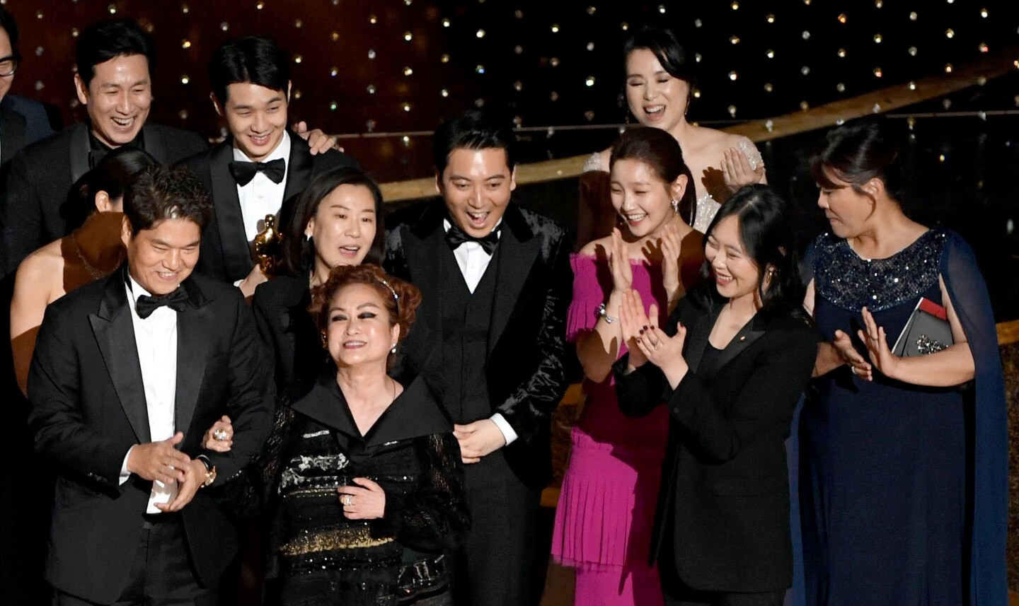 HOLLYWOOD, CALIFORNIA - FEBRUARY 09: (L-R) Executive producers Min Heoi Heo and Miky Lee, producer Kwak Sin-ae, and So-dam Park accept the Best Picture award for "Parasite" during the 92nd Annual Academy Awards at Dolby Theatre on February 09, 2020 in Hollywood, California. (Photo by Kevin Winter/Getty Images)
