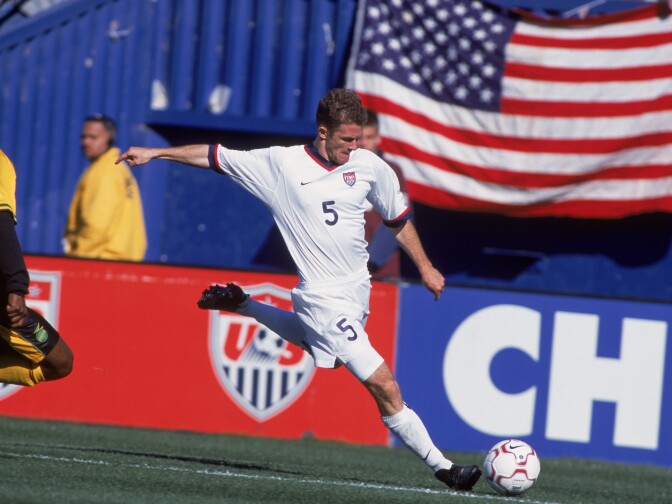 John O'Brien #5 of the USA kicks the ball away from Fabian Davis #16 of Jamaica during the World Cup Qualification game at the Foxboro Stadium in Foxboro, Massachusetts.  The USA defeated Jamacia 2-1 in 2001. 