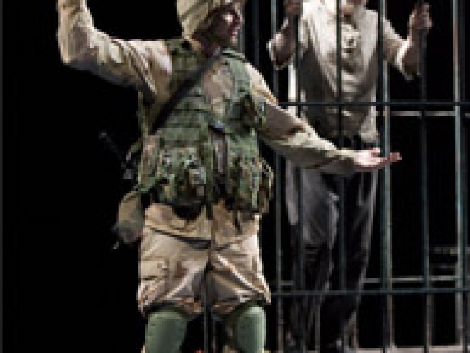 Brad Fleisher and Kevin Tighe (caged)