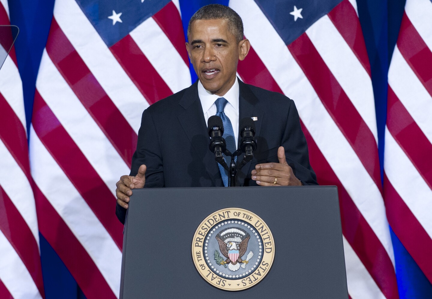 US President Barack Obama speaks about the National Security Agency (NSA) and intelligence agencies surveillance techniques at the US Department of Justice in Washington, DC, January 17, 2014.