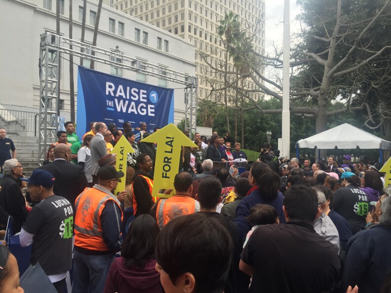 Supporters of raising the minimum wage in Los Angeles rally outside L.A. City Hall in January of 2015