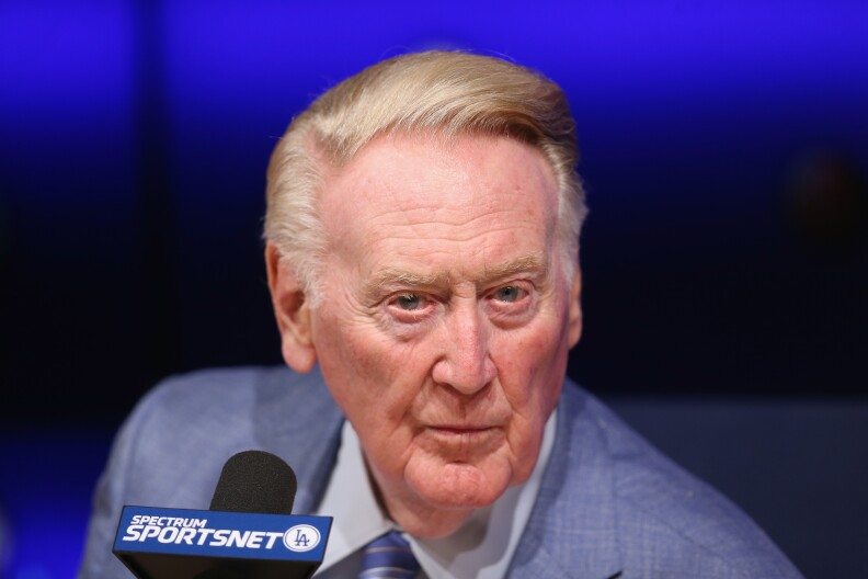 Long time Los Angeles Dodgers announcer Vin Scully listens to a question at a press conference discussing his career upcoming retirement at Dodger Stadium on September 24, 2016 in Los Angeles, California.  