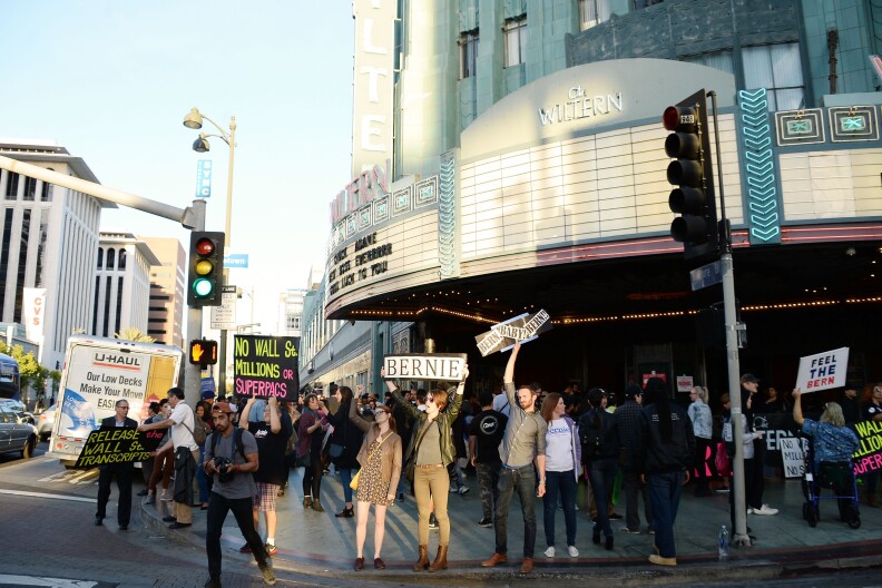 LOS ANGELES, CALIFORNIA - MARCH 23:  Supporters of Democratic presidental candidate Sen. Bernie Sanders gather before his rally at The Wiltern Theatre on March 23, 2016 in Los Angeles, California.  (Photo by Matt Winkelmeyer/Getty Images)