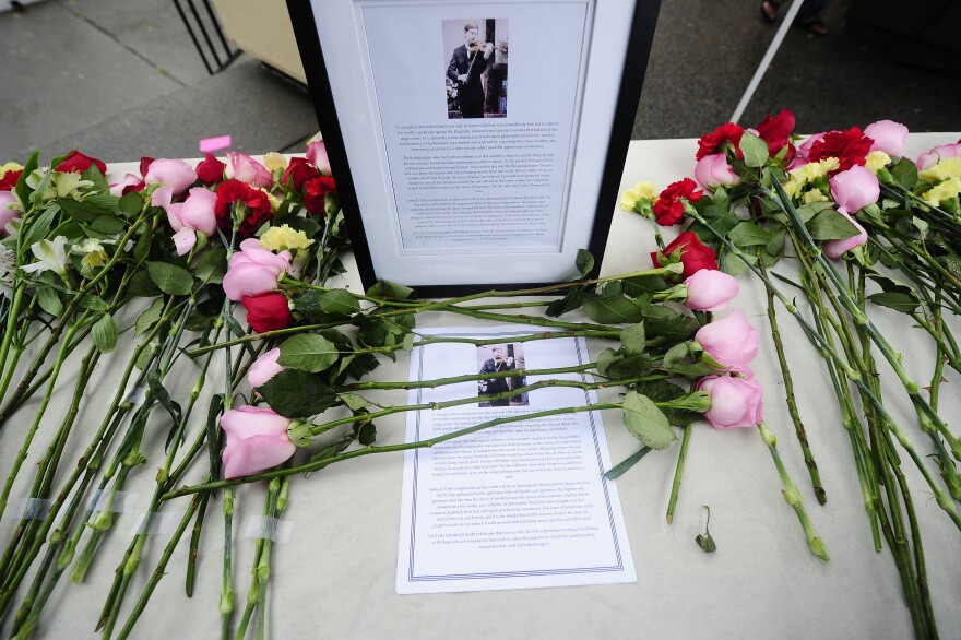 TO GO WITH AFP STORY by UTE MEHNERT - (FILES) Students pay their respects on October 1, 2010 to first-year student Tyler Clementi, 18, who killed himself shortly after being filmed and broadcast over the Internet during a gay encounter at Rutgers Univeristy in New Brunswick, New Jersey.  Clementi killed himself shortly after being spied on. Two undergraduates have been arrested after the fellow student they allegedly filmed and broadcast over the Internet leapt to his death from a New York bridge. Prosecutors said that two students at Rutgers had been charged with invasion of privacy and that investigators were considering further charges linked to the fact that Clementi was apparently filmed in a homosexual act.   AFP PHOTO/Emmanuel Dunand (Photo credit should read EMMANUEL DUNAND/AFP/Getty Images)