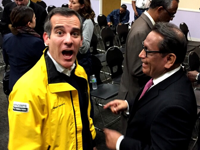 At the LA Mission before the homeless count, LA Mayor Eric Garcetti mugs with LA City Councilman Gil Cedillo.