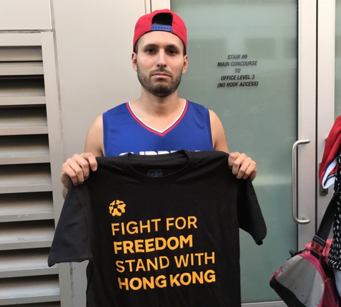 L.A. Clippers fan Ernesto Becerra of Upland said he would put on the shirt inside Staples to show support for Hong Kong protesters.
