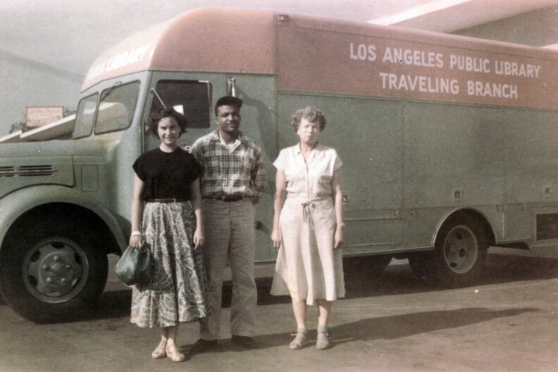 People standing in front of Library Bookmoblie, circa 1950