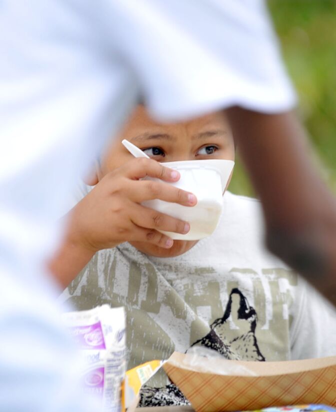 A student eats his cereal during breakfast period at Brockton Avenue Elementary School in Los Angeles. Children often struggle to finish their meals during lunch periods. The median time in U.S. elementary schools is 25 minutes. Credit: Richard Hartog for California Watch