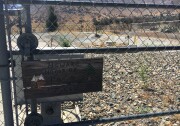 This chain link fence and a sign warning visitors to beware pets named "Taco and Tiger" is what little remains after the Erskine Fire burned hundreds of mobile homes in South Lake near Lake Isabella.