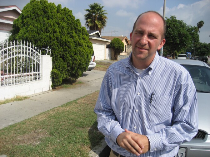 L.A. Unified School District board member Steve Zimmer outside the home of a high school dropout. He and other educators formed one of 10 teams out to "recover" students who'd stopped showing up to school. Zimmer and his team recovered 15 students from neighborhoods near Fremont High School in South L.A.