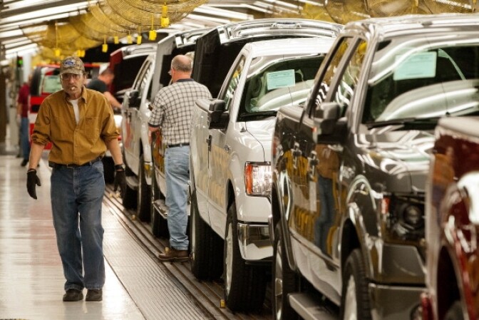 The Labor Department Wednesday reports that U.S. worker productivity grew a modest amount from January through March after having declined in the previous quarter. (Photo: Ford Motor Co. F-150 trucks move along the Kansas City, Mo. assembly line in May 2013.   Photo by Kevin Anderson/Bloomberg via Getty Images).