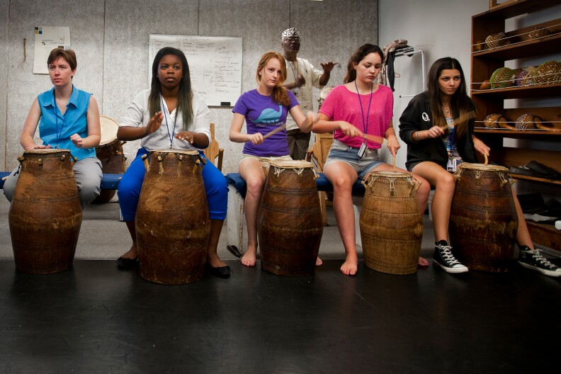 Alfred Ladzekpo, right, teaches an African music and dance class during the California State Summer School for the Arts program at CalArts.
