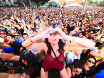 Music fans attend day 1 of the 2014 Budweiser Made in America Festival at Los Angeles Grand Park on August 30, 2014 in Los Angeles, California.
