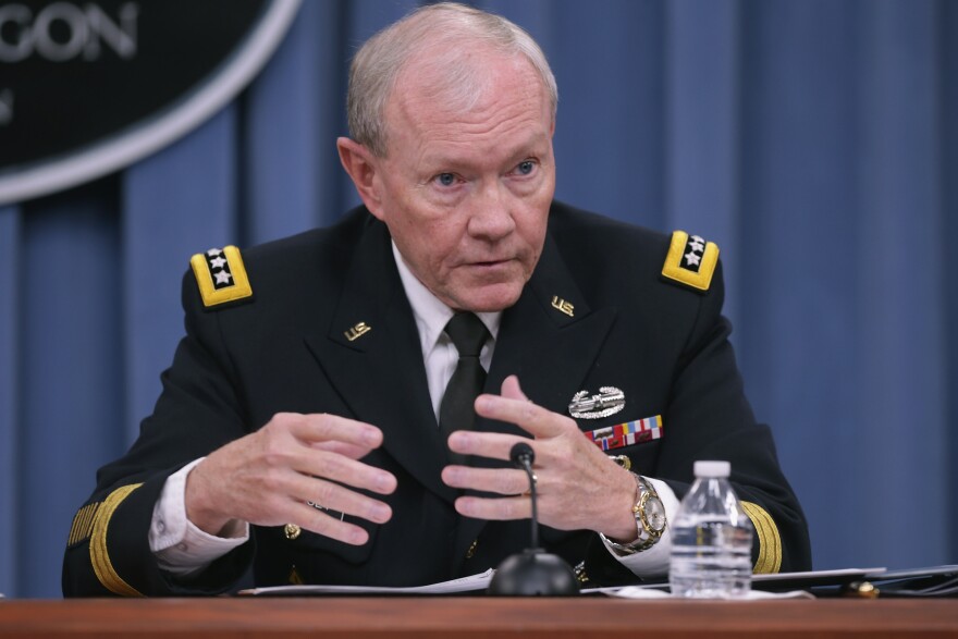 ARLINGTON, VA - OCTOBER 30:  Chairman of the Joint Chiefs of Staff Gen. Martin Dempsey answers reporters' questions during a news conference at the Pentagon October 30, 2014 in Arlington, Virginia. U.S. Dempsey and Defense Secretary Chuck Hagel fielded questions about the terrorist group ISIL, U.S. troop deployment to West Africa to counter Ebola and the continued draw-down of troops in Afghanistan.  (Photo by Chip Somodevilla/Getty Images)